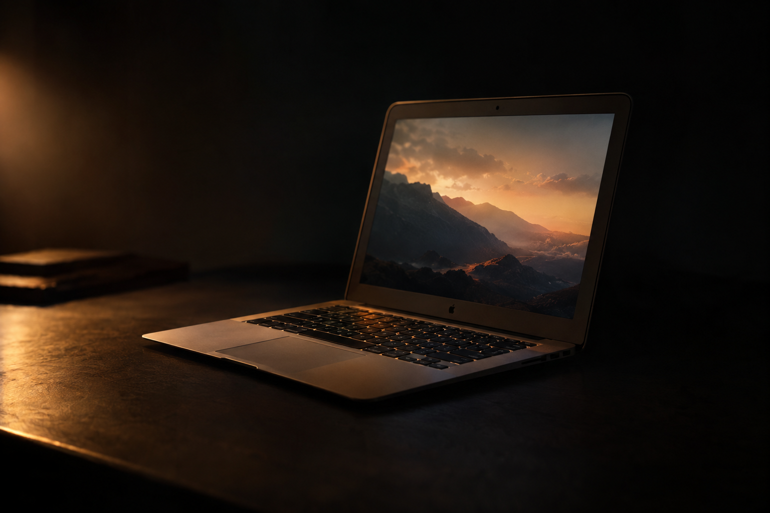 A thin aluminum laptop shown in profile against a soft gray studio background